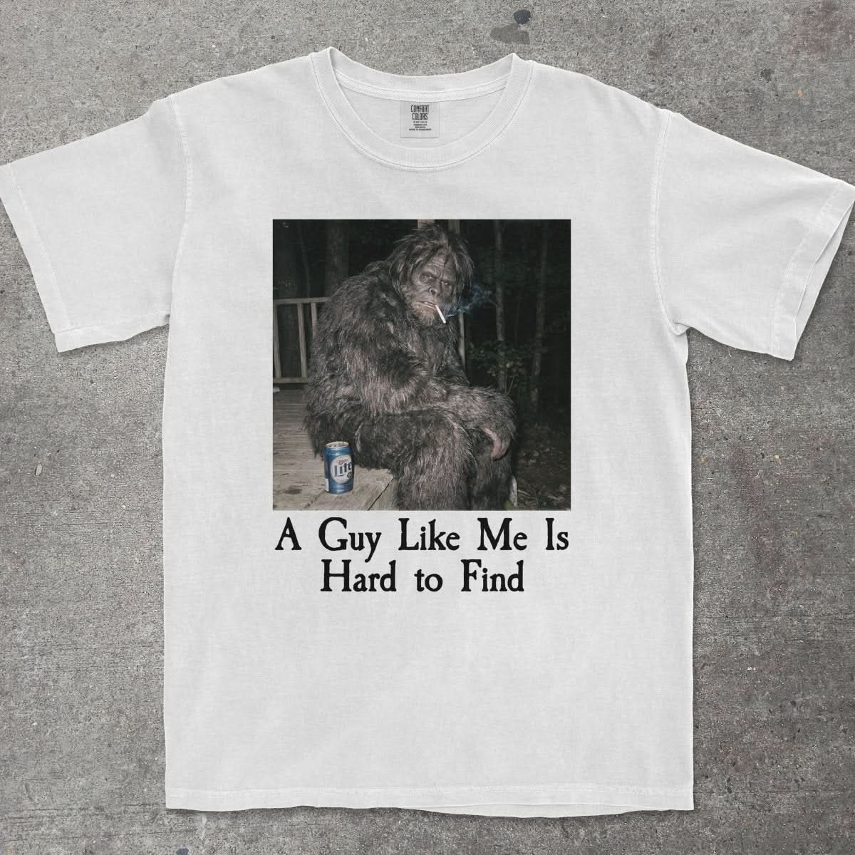 A GUY LIKE ME IS HARD TO FIND BIGFOOT SHIRT - TeeHeeUSCo - T-Shirt