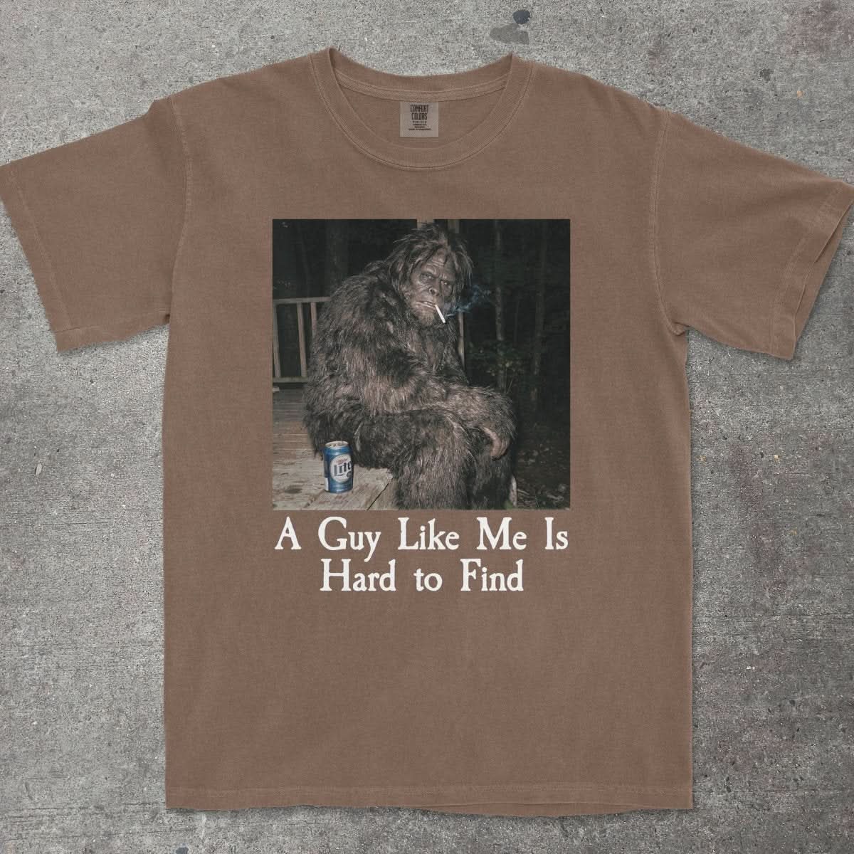 A GUY LIKE ME IS HARD TO FIND BIGFOOT SHIRT - TeeHeeUSCo - T-Shirt