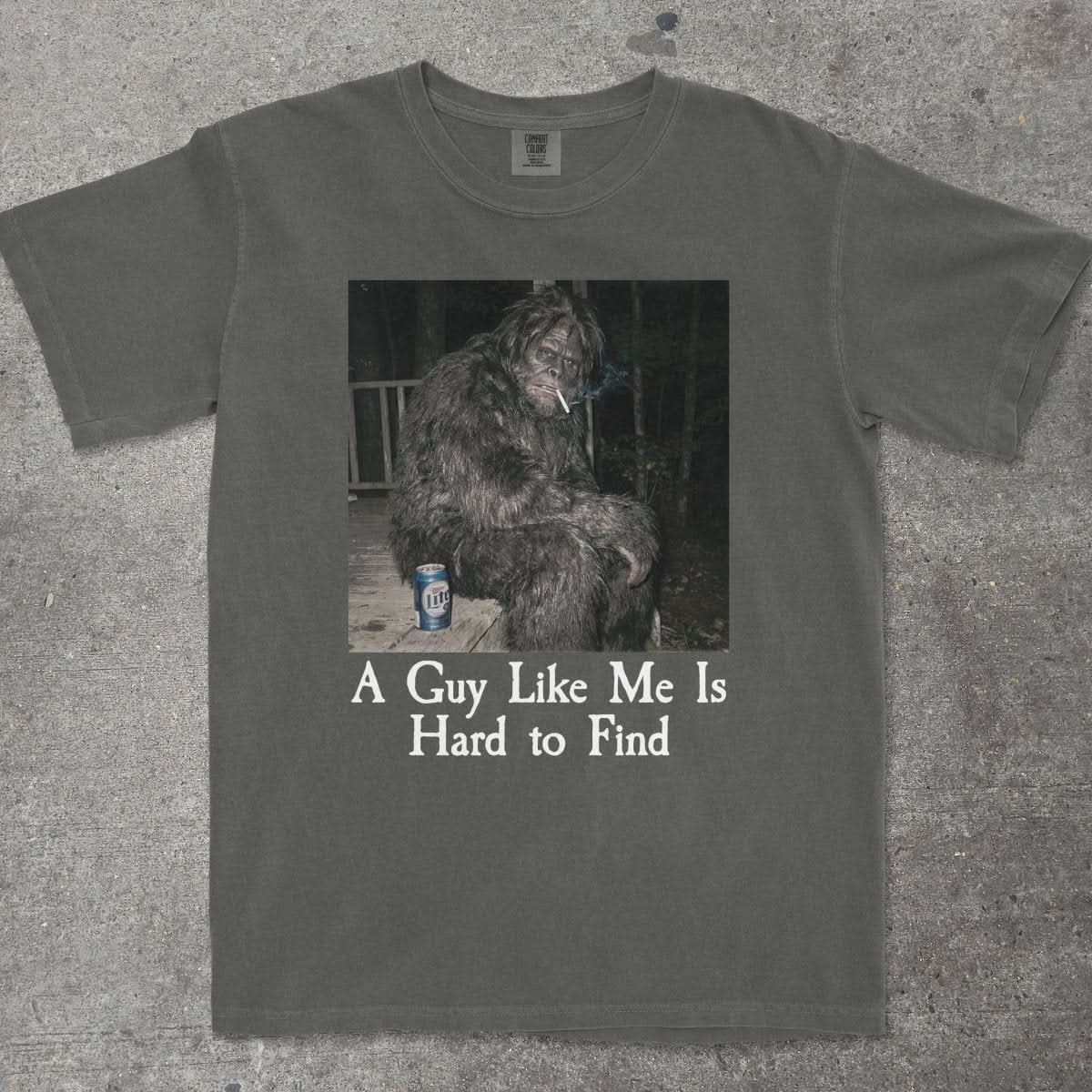 A GUY LIKE ME IS HARD TO FIND BIGFOOT SHIRT - TeeHeeUSCo - T-Shirt