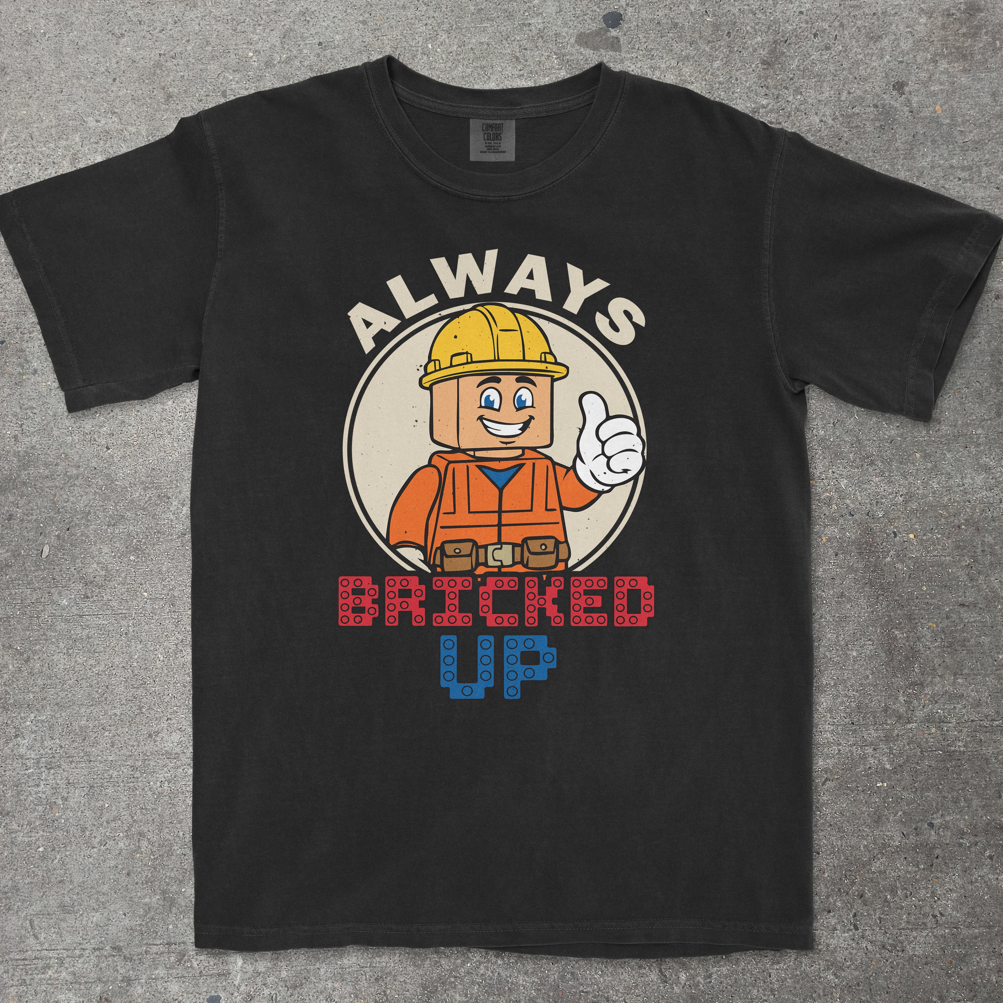 Black graphic tee featuring "ALWAYS BRICKED UP" text with construction-themed mascot design - TeeHeeUSCo