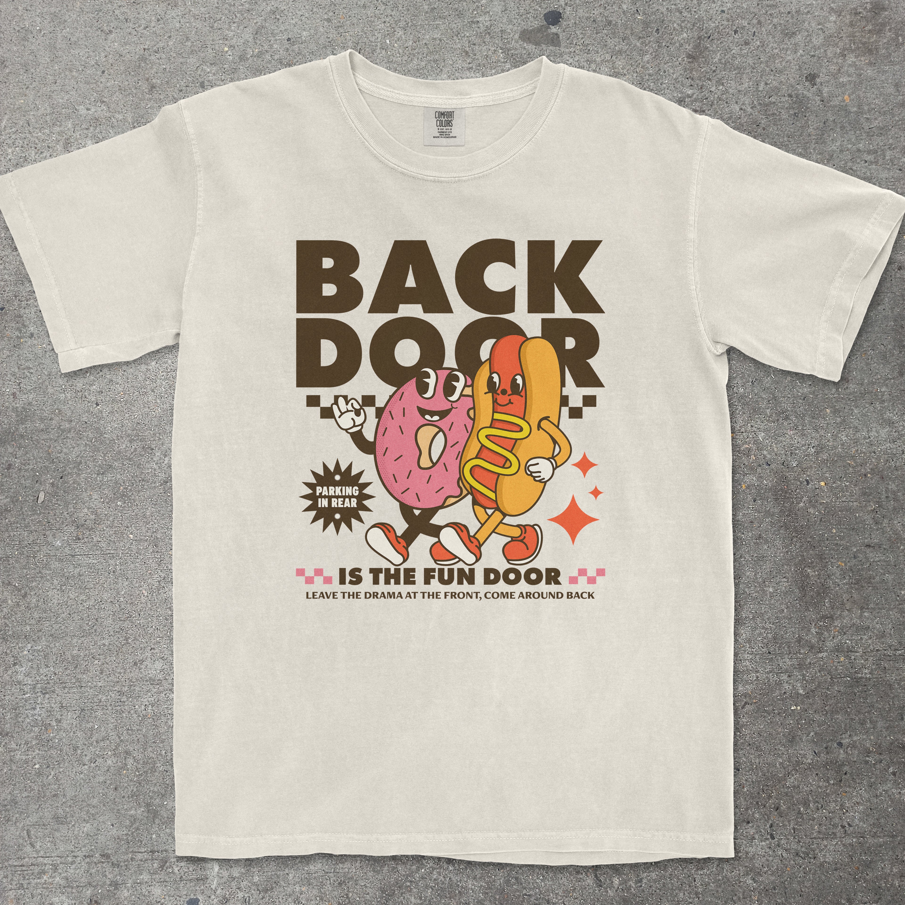White t-shirt with cartoon characters and text on a gray background