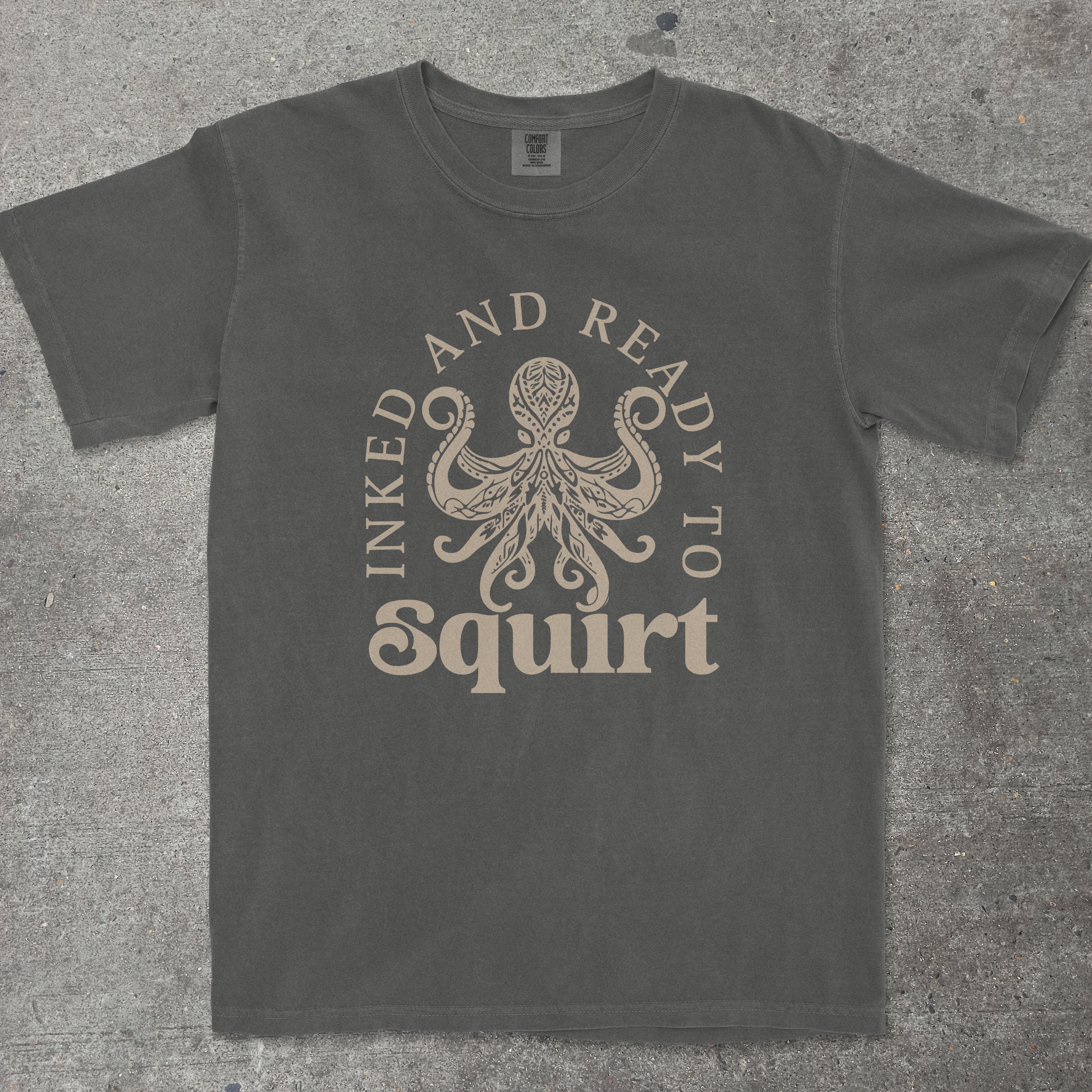 Pepper graphic tee featuring cartoon squid mascot with "Inked and Ready to Squirt" text - TeeHeeUSCo