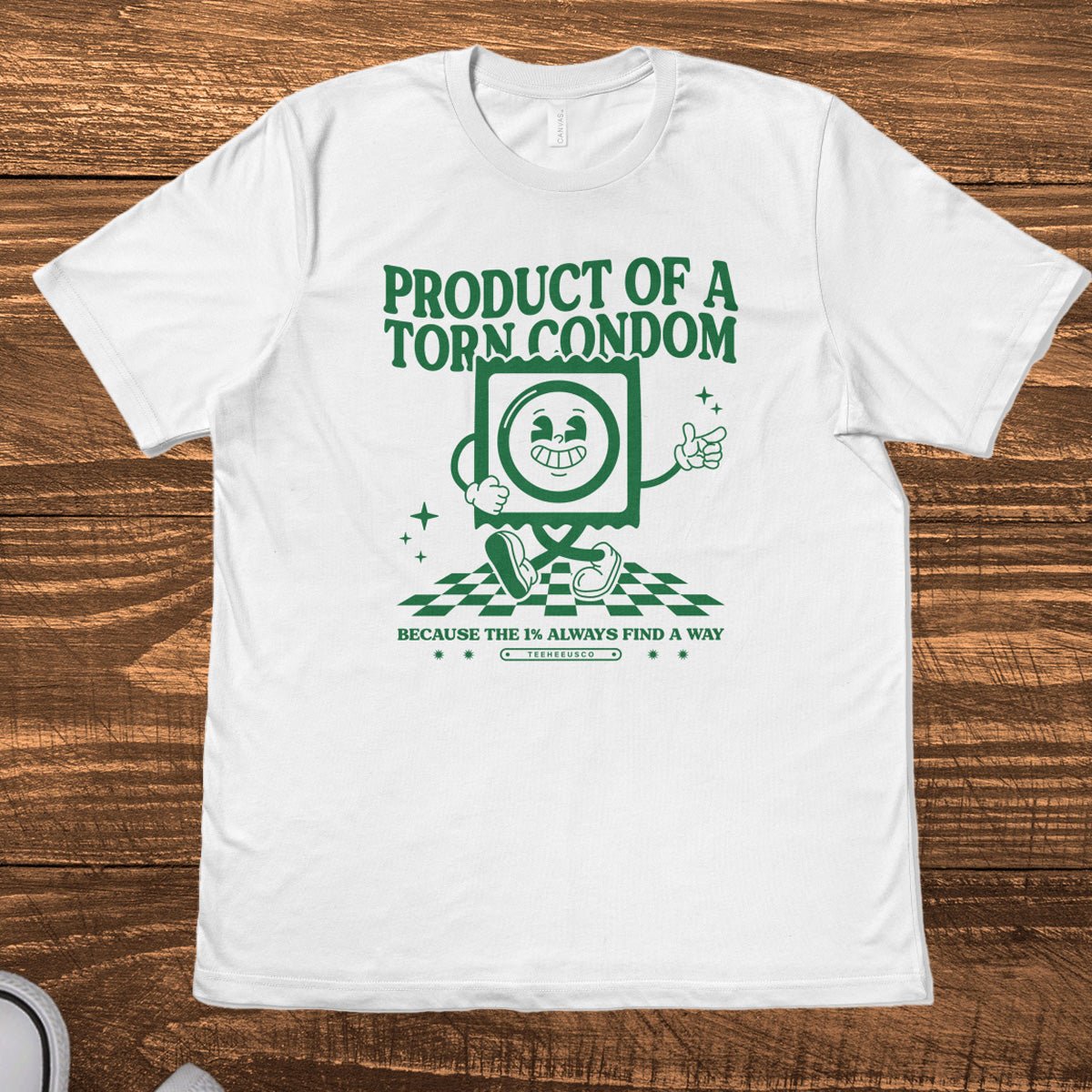 Retro mascot graphic tee featuring "Product of a Torn Condom" text design on heather shirt - TeeHeeUSCo