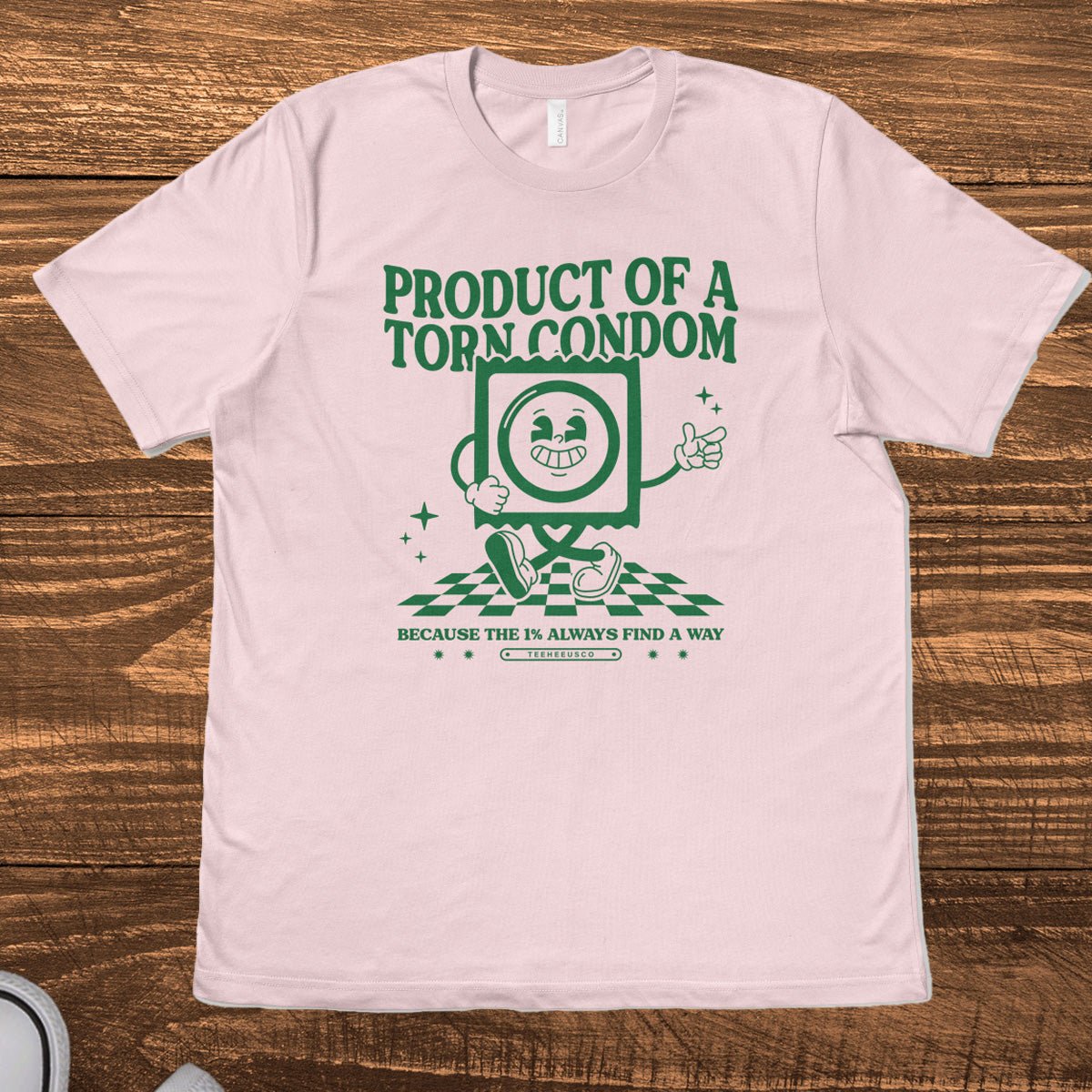 Retro mascot graphic tee with "Product of a Torn Condom" text on heather colored shirt - TeeHeeUSCo