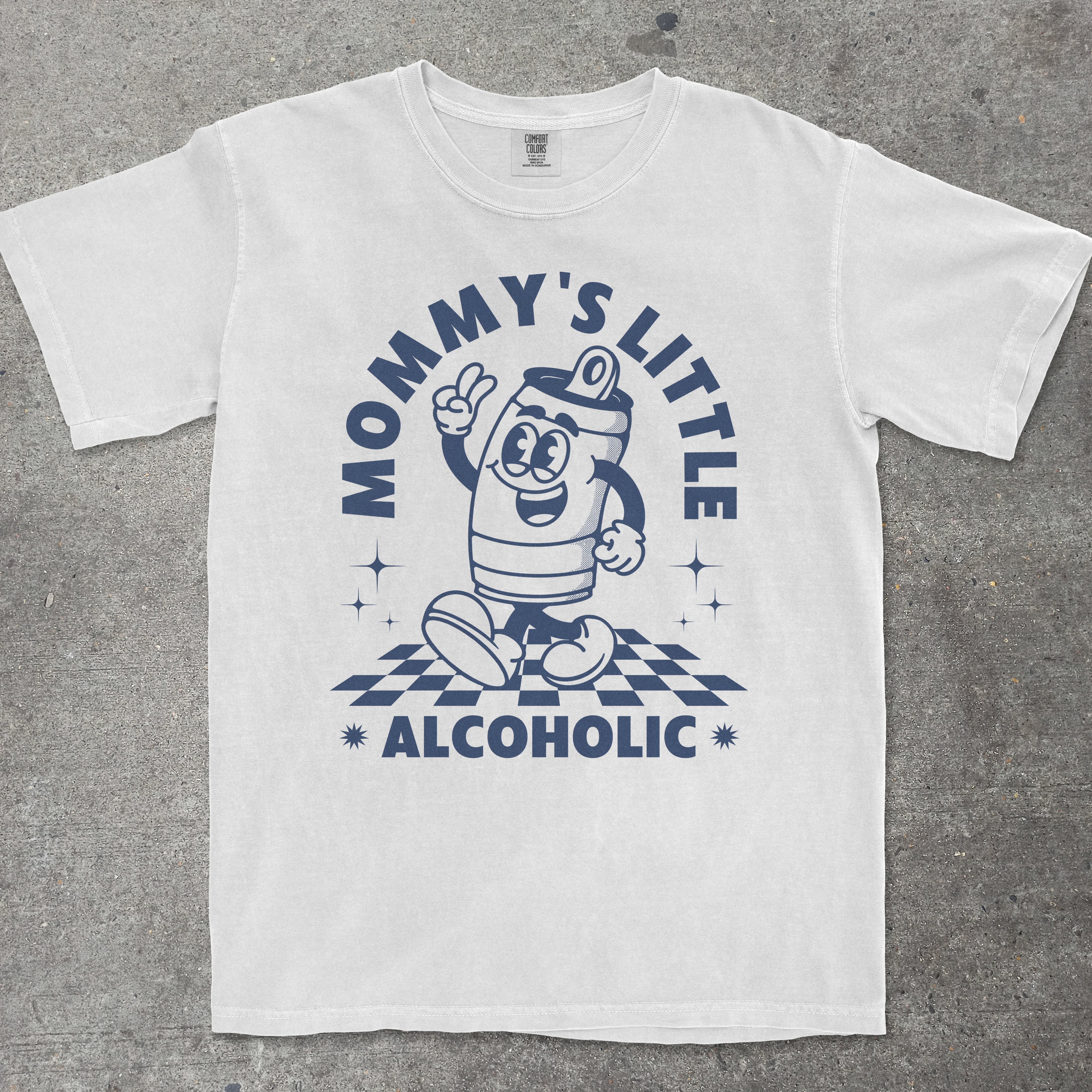 White t-shirt with blue graphic and text on a gray surface